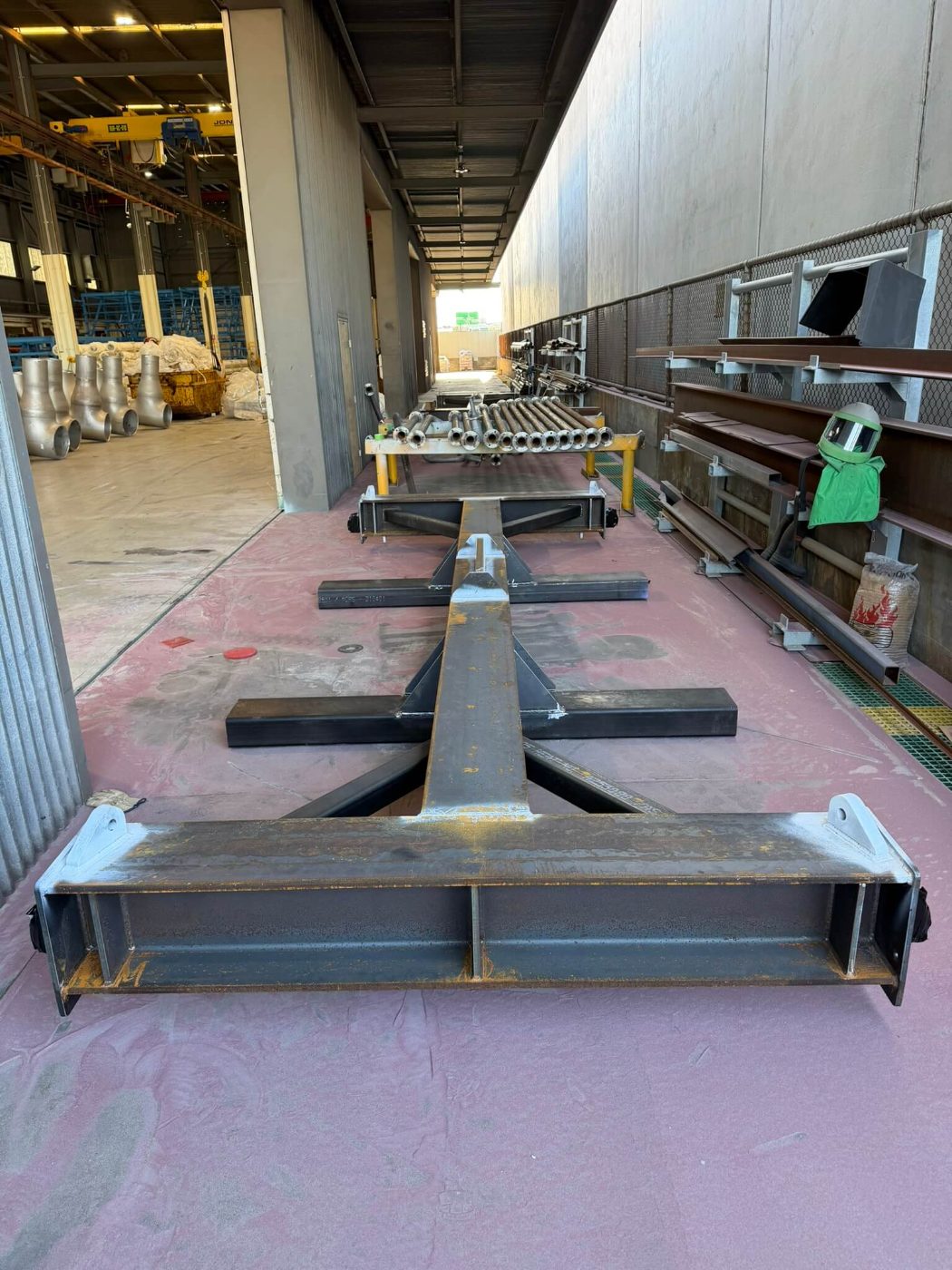 Fabricated lifting beam and spreader frame with mill scale and surface rust before blasting