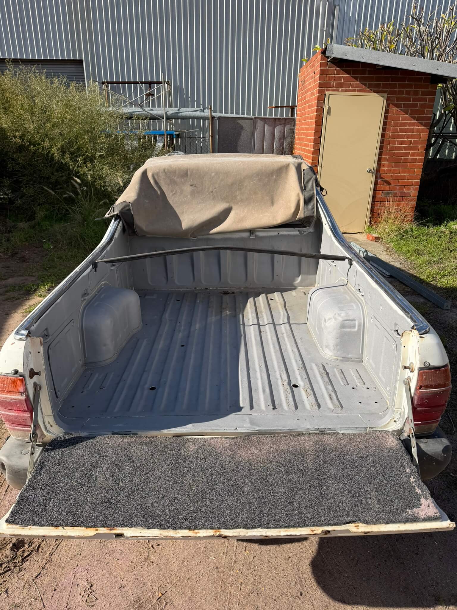 The same ute bed blasted back and coated in primer, ready for topcoat