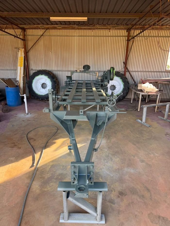 Farm implement frame sandblasted back to bare steel and primed in a WA shed