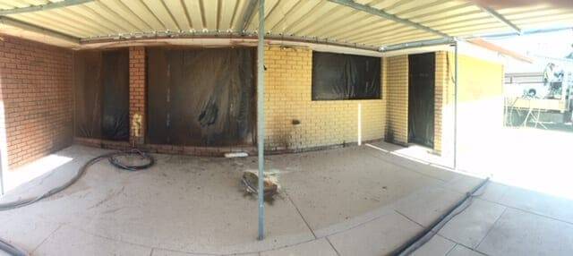 Limestone, paint stripped Painted limestone and brick wall stripped inside a Perth warehouse