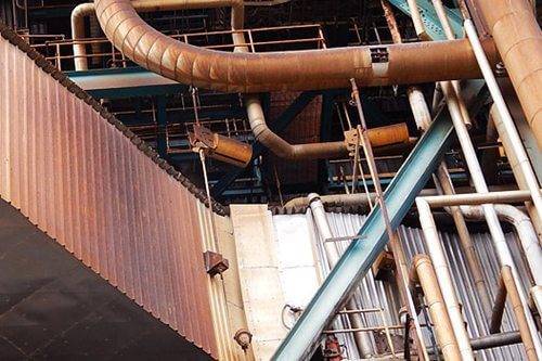 Refinery pipework Corroded refinery pipework and structural steel prepped on site in WA