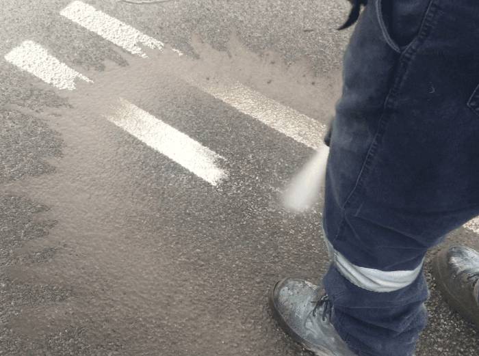 Road line marking removal on a Western Australian sealed road