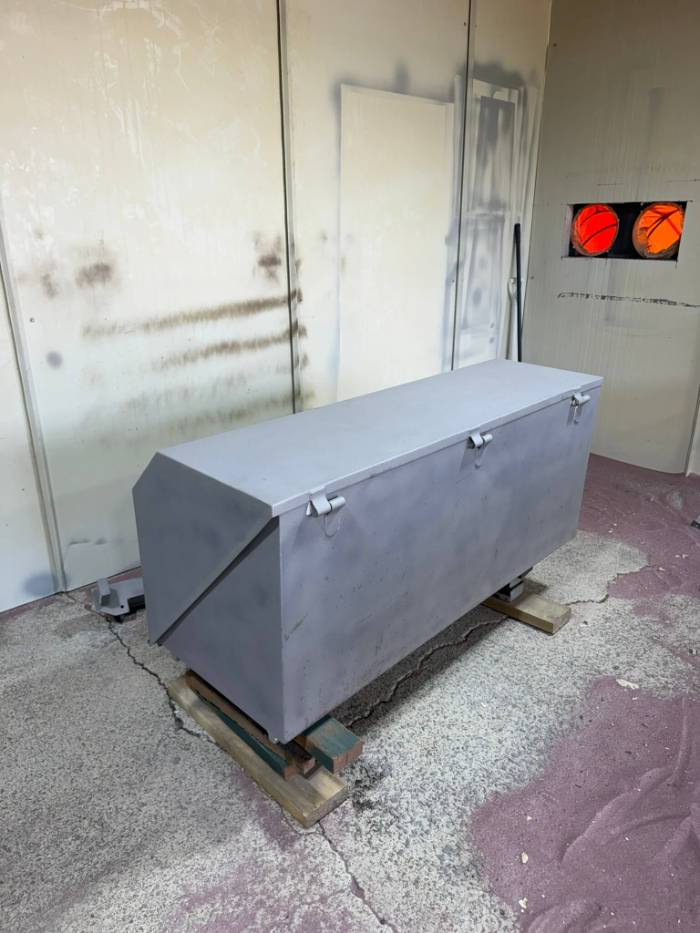 Steel toolbox blasted and primed grey ready for topcoat