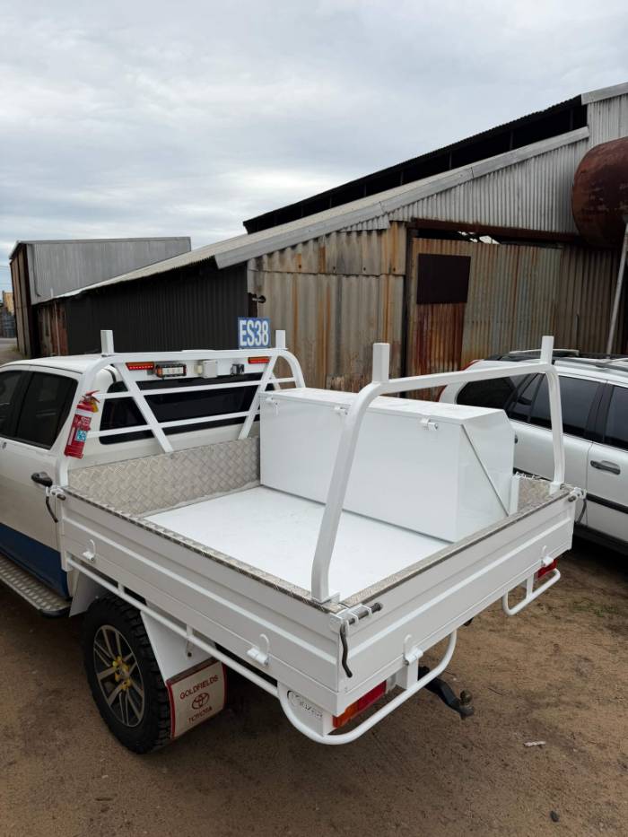 Ute tray deck repainted in orange after blasting