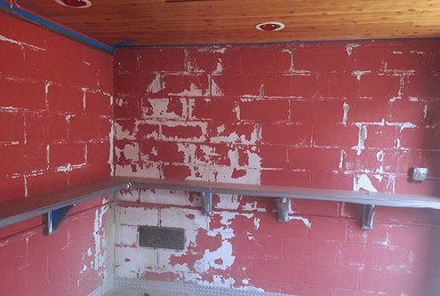 Concrete Paint Removal - Red Painted Block Wall
